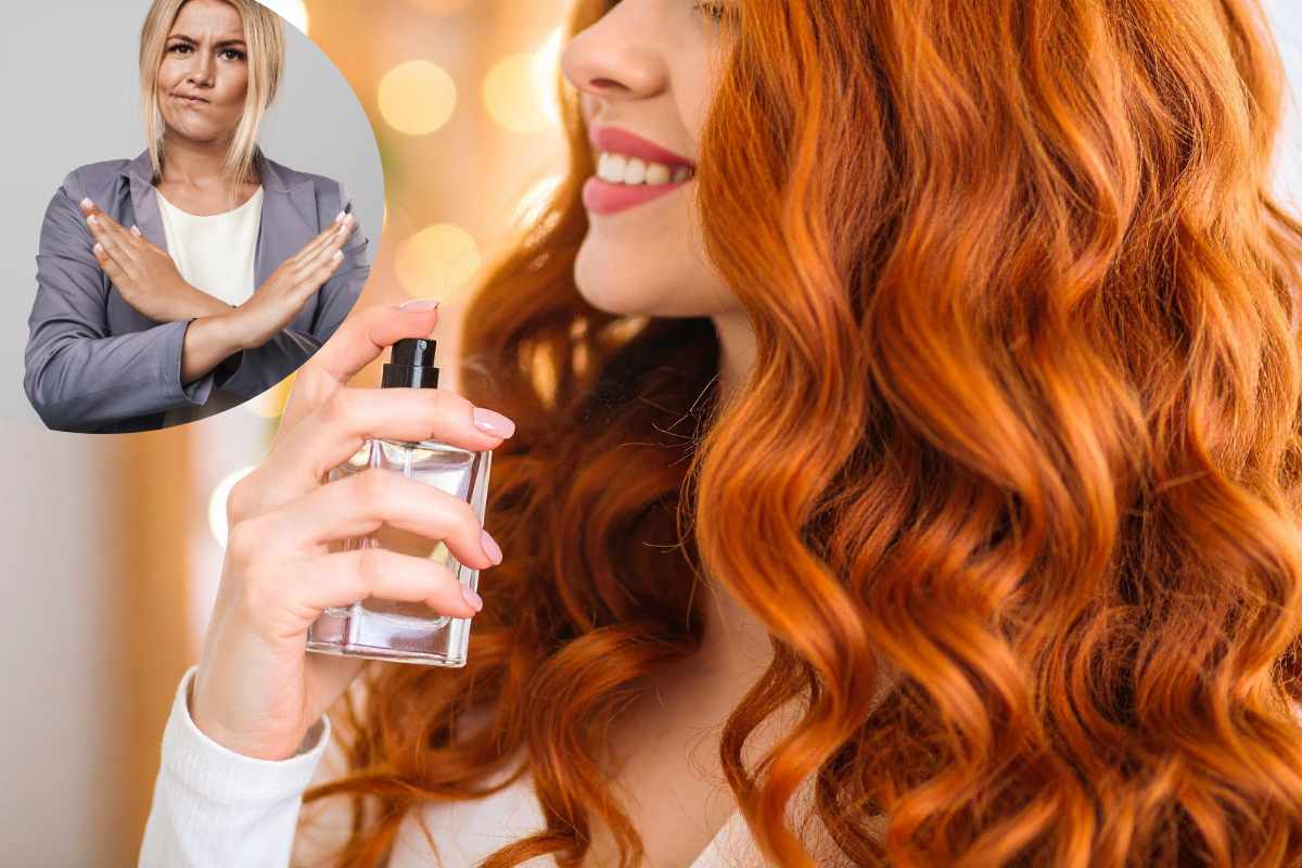 donna che spruzza il profumo